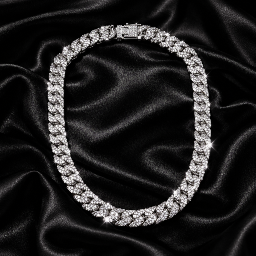 Iced out Cuban link chain necklace on black satin with crystal sparkle lighting